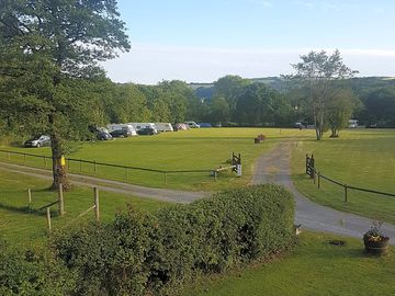 Electric grass touring pitch in summertime