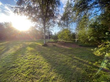 Picnic bench under the trees