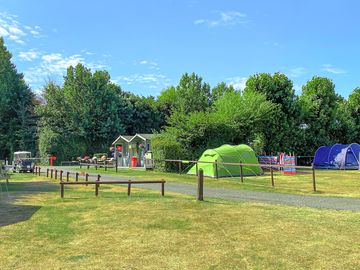 Grass pitches and site entrance