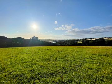 Early morning sun on the camping field