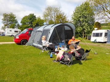 Guests with their new driveaway awning