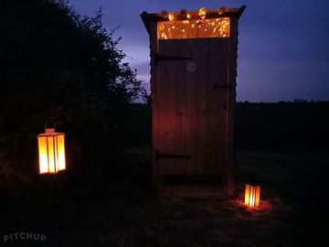 Compost toilet with pretty lights