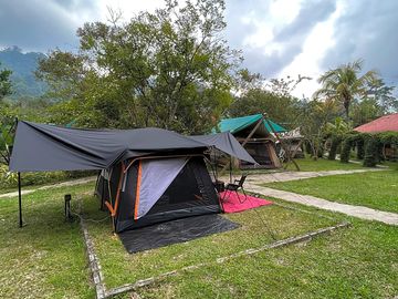 Pitched tent on grass pitch