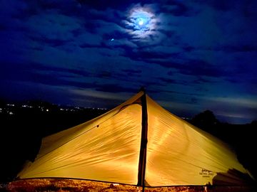 Moon lit camping on a standard tent pitch.