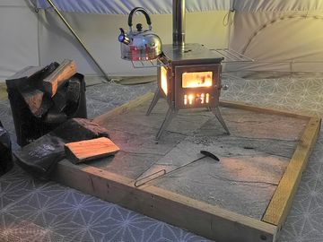 Woodburning stove in the tent