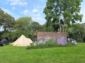 Grass tent pitch