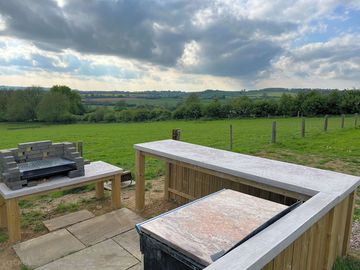 Charcoal barbecue and outside bar area
