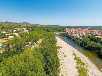 Aerial view of the site and river beach