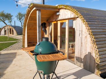 Deck with big green egg barbecue