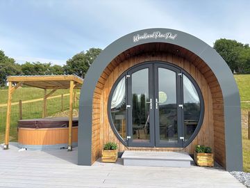 Front view of the pod and hot tub