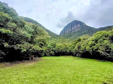Grassy pitches with mountain views