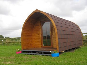 Wooden pod with underfloor heating