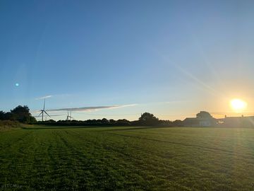 Sunset over the pitches