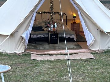 Letting the countryside air into the luxury bell tent
