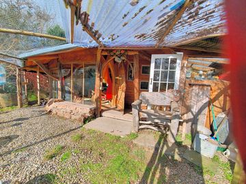 the gravelled  patio in front