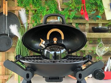 Gas barbecue and whistling kettle