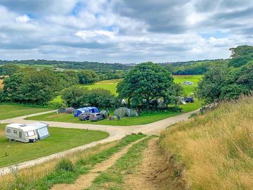 A visitor image of the lovely walk up to the village with a view of the campsite