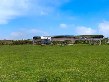 Looking from the camping field to the barns
