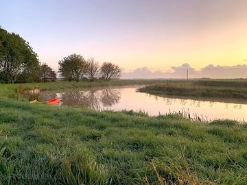 riverside sunsets and sunrise