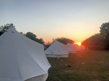 Bell tents at sunset