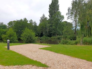 Lakeside pitches surrounded by greenery