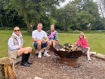 Enjoy relaxing by the lake here at holt hollow in your own cabin in the woods