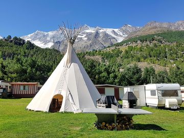 View across the site and the communal tipi