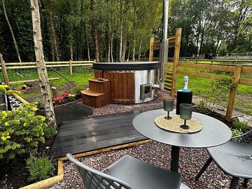 A glass or two by the hot tub