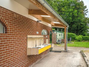 Sinks at the front of the bathroom block