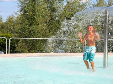 Swimming pool with large fountain