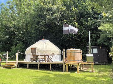 Private single yurt and wood fired hot tub in a rural setting at Mylor Bridge, Cornwall.