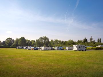 Spacious level touring and camping area at arrow bank