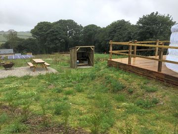Each yurt has its own firepit, a picnic table and a shelter