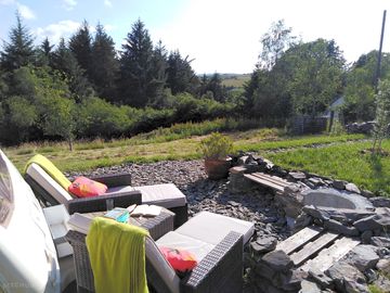Super comfortable outdoor lounge area with a wonderful view and soundtrack of birdsong.