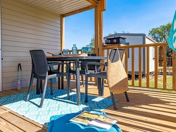 Caravan exterior with a covered terrace