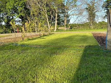 Hard standing and grassed area