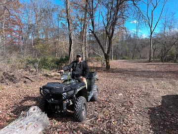 Atv camping among the trees