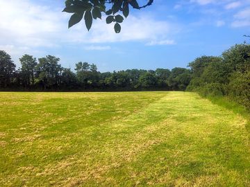 Sheltered camping field