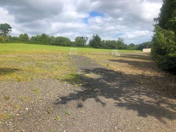 Grass tent and touring pitch field higher