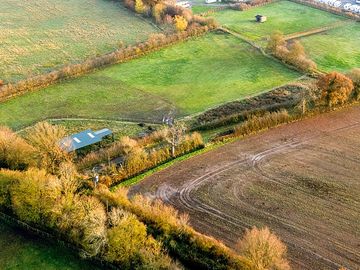 Aerial view of the site and location