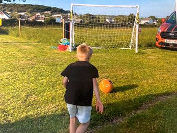 Practice shots at the football net