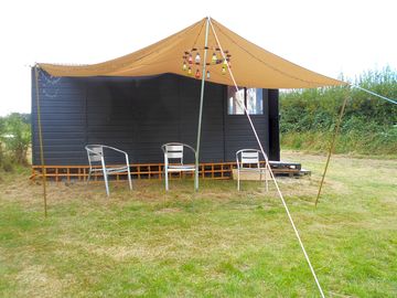 Relax under the awning and read a book in the peace and quiet