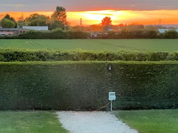 Sunset with humber bridge in background from site