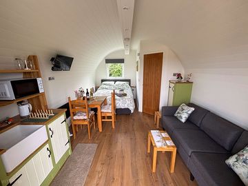 Pod interior showing the door to the bathroom