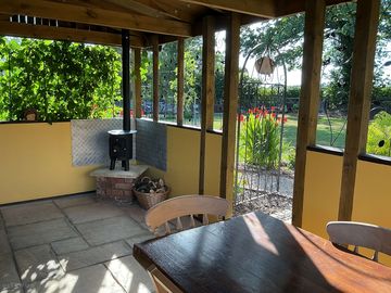 Shared seating under cover.