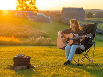 Campfire cooking, acoustic guitar and a sunset....a perfect night!