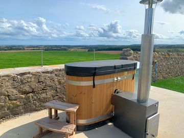 Log fired hot tub at Fern