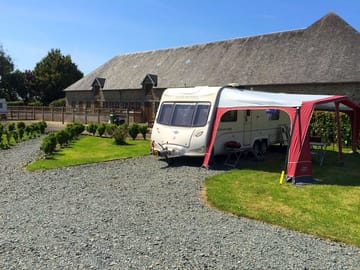 Unit on the gravel pitch with an awning