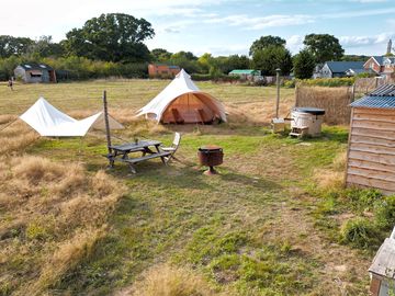 Willows pitch with its private hot tub, fire bowl, and eco toilet.
