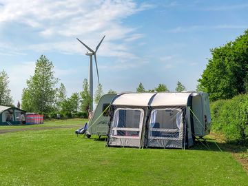 Windmill and grass pitch